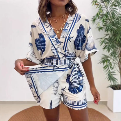 Flattering V-Neck Playsuit in Exotic Tropical Print – Your Summer Holiday Essential 🏝️🌸